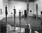 Giacometti installing his sculptures at the Venice Biennale in 1962